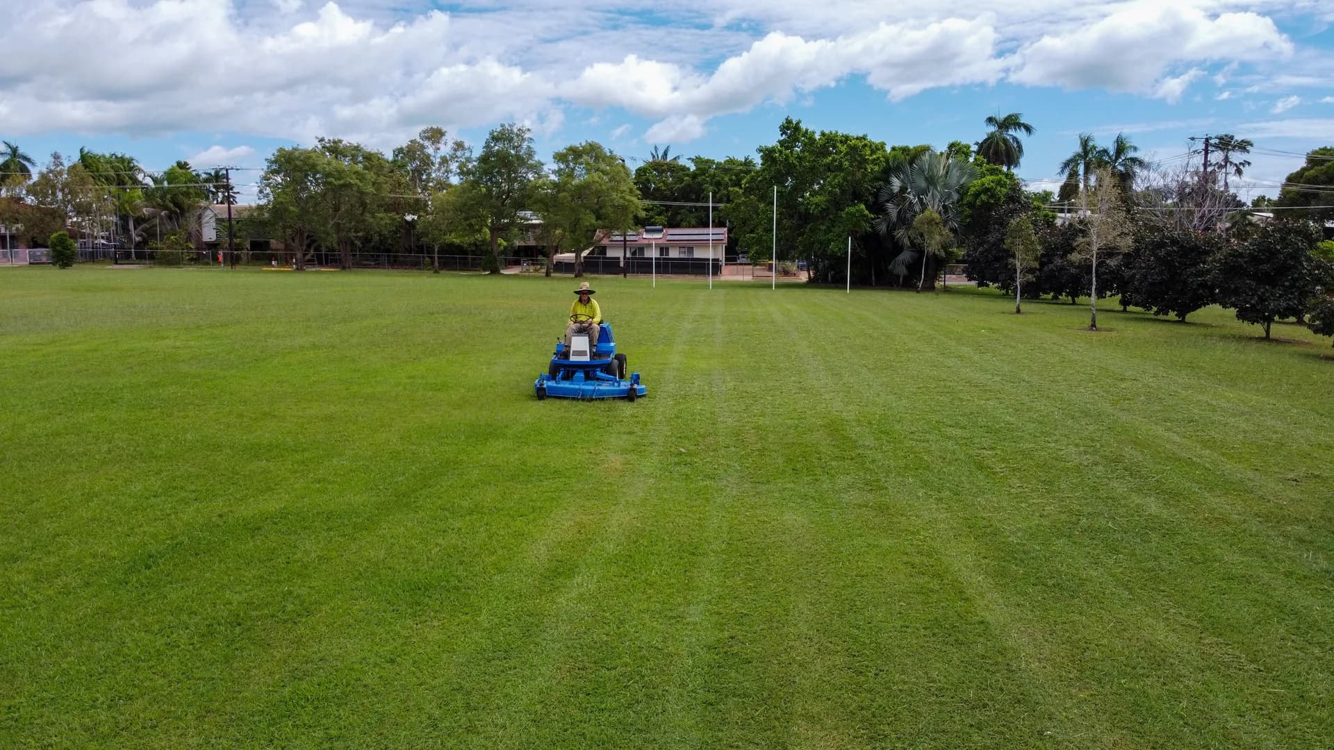 Aerial view of professional grounds maintenance on a Darwin sports oval